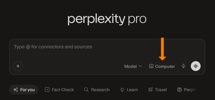 A screenshot of the Perplexity Pro search bar in dark mode. An orange arrow points to the "Computer" toggle button, located between the model selector and the microphone icon. Below the search bar, quick-access chips include "For you," "Fact Check," "Research," and "Learn".