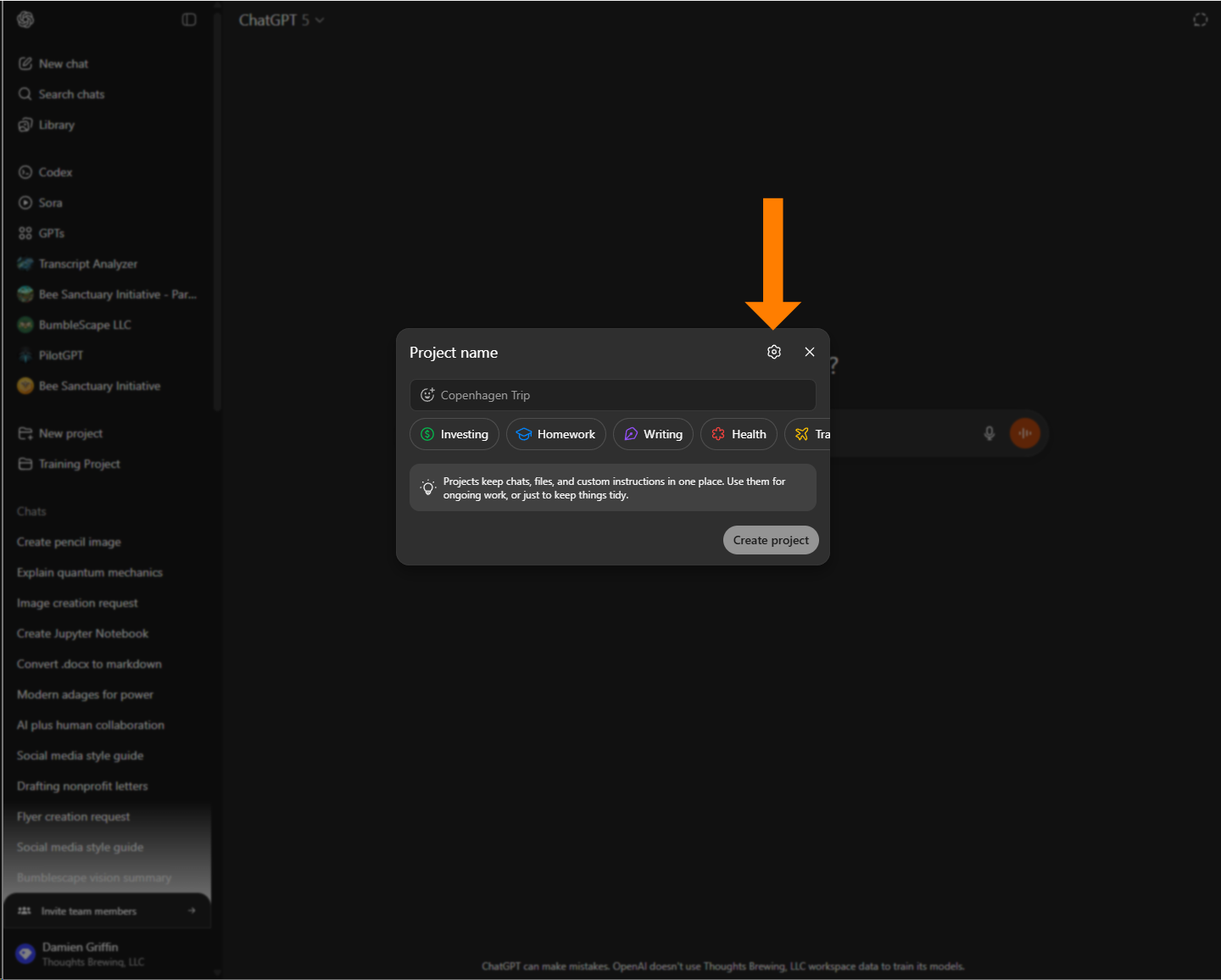 A screenshot of the ChatGPT interface with a pop-up window to create a new project. A large orange arrow points to a settings gear icon, which opens project options